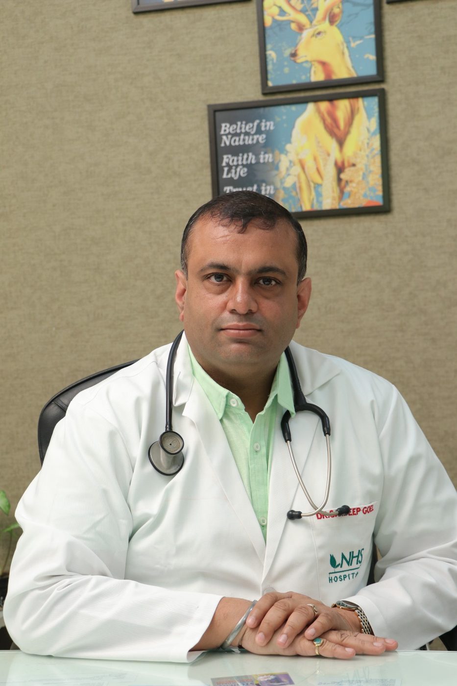 Consultant in clinic at NHS Hospital